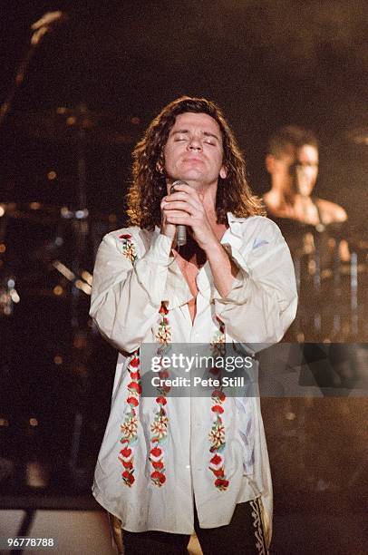 Michael Hutchence of INXS performs on stage on the 'Kick' tour at Wembley Arena on June 24th, 1988 in London, United Kingdom.