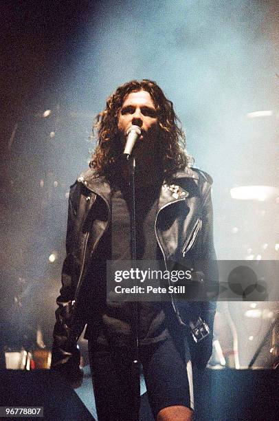 Michael Hutchence of INXS performs on stage on the 'Kick' tour at Wembley Arena on June 24th, 1988 in London, United Kingdom.