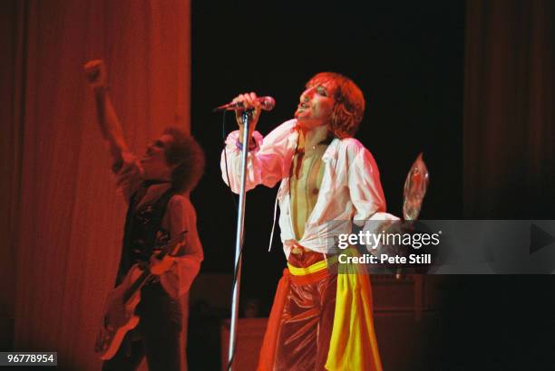 Rod Stewart performs on stage with band member Jim Cregan at The Playhouse Theatre, on January 10th, 1977 in Edinburgh, Scotland.