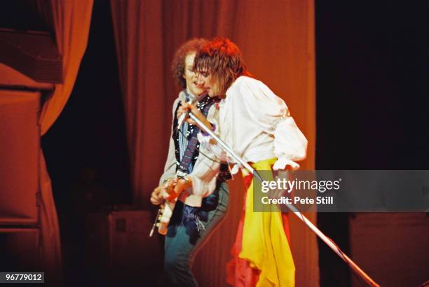 Rod Stewart performs on stage with band member Jim Cregan at The Playhouse Theatre, on January 10th, 1977 in Edinburgh, Scotland.