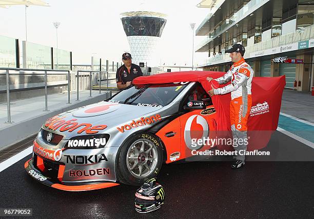 Roland Dane owner of Triple Eight Racing and Jamie Whincup driver of the Team Vodafone Holden unveil the number one car during previews for round one...