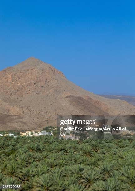 Village in an oasis in front of the mountain, Ad Dakhiliyah Region, Al Hamra, Oman on May 10, 2018 in Al Hamra, Oman.