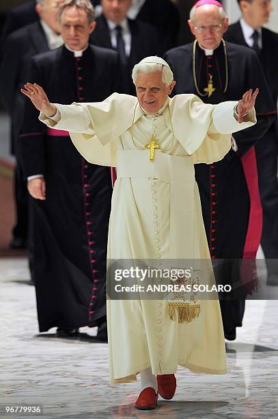 Pope Benedict XVI waves to faithful as he arrives for his weekly general audience on February 17, 2010 at Paul VI hall at The Vatican. AFP PHOTO /...