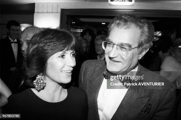 Danièle Evenou et Georges Fillioud lors de la réouverture de la brasserie du 'Boeuf sur le Toit' à Paris le 28 octobre 1985, France.