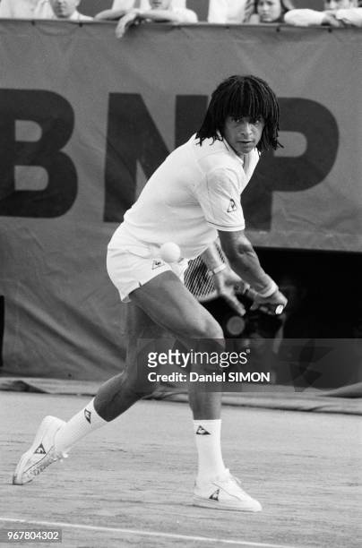 Yannick Noah lors de son match contre Ivan Lendl au tournoi de Roland-Garros le 31 mai 1983 à Paris, France.