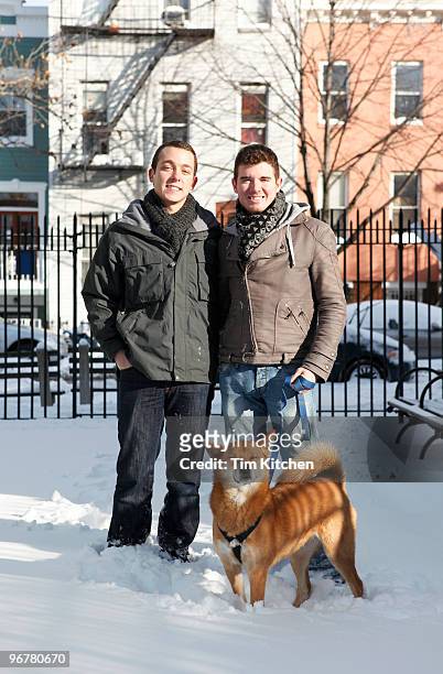 male couple and dog outdoors, winter, portrait - shiba inu winter stock pictures, royalty-free photos & images