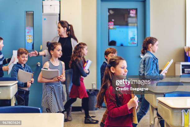 students entering in class - entering stock pictures, royalty-free photos & images