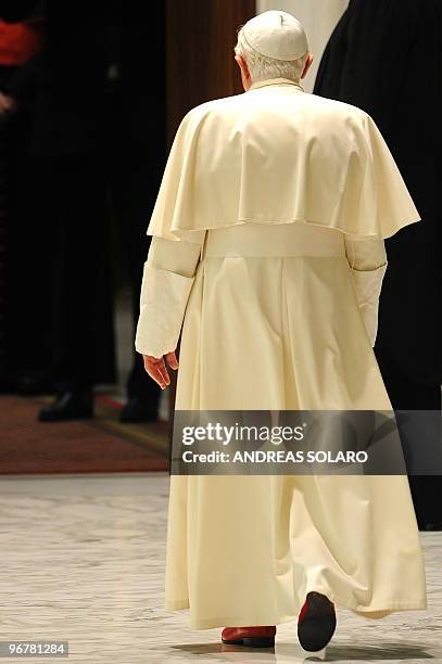 Pope Benedict XVI leaves at the end of his weekly general audience on February 17, 2010 at Paul VI hall at The Vatican. AFP PHOTO / ANDREAS SOLARO