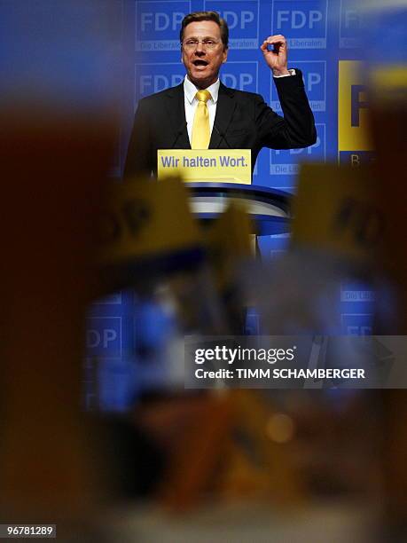 German Foreign Minister and vice-chancellor Guido Westerwelle addresses the audience during his party's Ash Wednesday meeting on February 17, 2010 in...