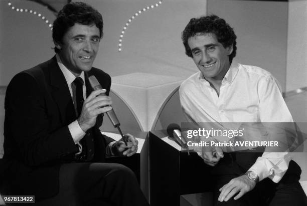 Sacah Distel et Alain Prost lors d'une émission de télévision à paris le 25 octobre 1984, France.
