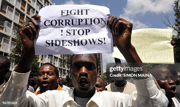 Kenyans take part in a demonstration on February 17, 2010 to vent their anger at a coalition government slowly falling apart over graft allegations...