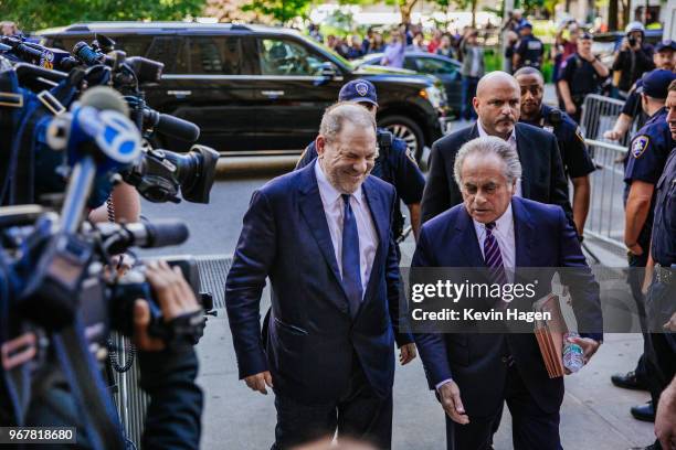 Harvey Weinstein arrives at State Supreme Court with attorney Benjamin Brafman following Weinstein's arraignment on June 5, 2018 in New York City....