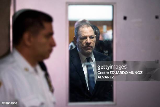 Harvey Weinstein exits the Manhattan Criminal Court room on June 5, 2018 in New York. Weinstein pleaded not guilty to rape and sexual assault charges...