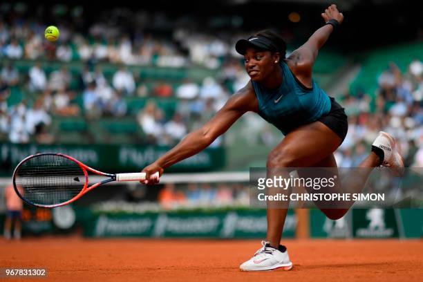 Sloane Stephens of the US returns the ball to Russia's Daria Kasatkina during their women's singles quarter-final match on day ten of The Roland...