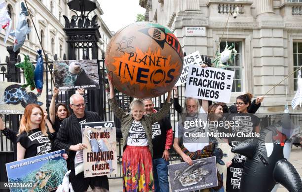 British fashion designer Dame Vivienne Westwood stage an anti-fracking protest with campaigners outside Downing Street on June 5, 2018 in London,...