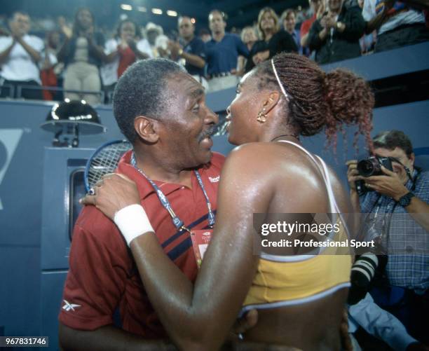 Venus Williams of the USA celebrates with her father Richard after defeating Lindsay Davenport of the USA in the Women's Singles Final of the US Open...