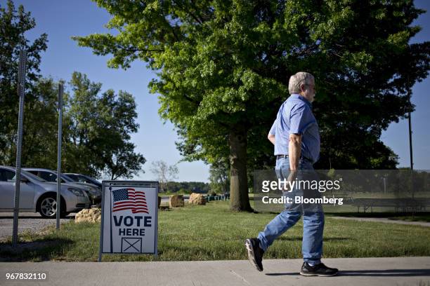 Voter arrived at a polling station in Davenport, Iowa, U.S., on Tuesday, June 5, 2018. Even as Donald Trump tweets his support for U.S. Agriculture,...