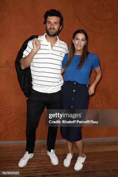 Journalist Antoine Benneteau and actress Charlotte Gabris attends the 2018 French Open - Day Ten at Roland Garros on June 5, 2018 in Paris, France.