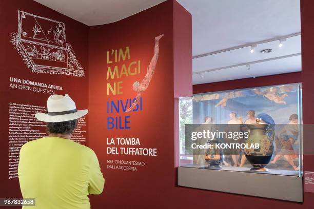 Visitor looks the exhibition 'L'Immagine Invisibile' at Archaeological Museum in Paestum southern Italy. The exhibition shows paintings, frescoes,...