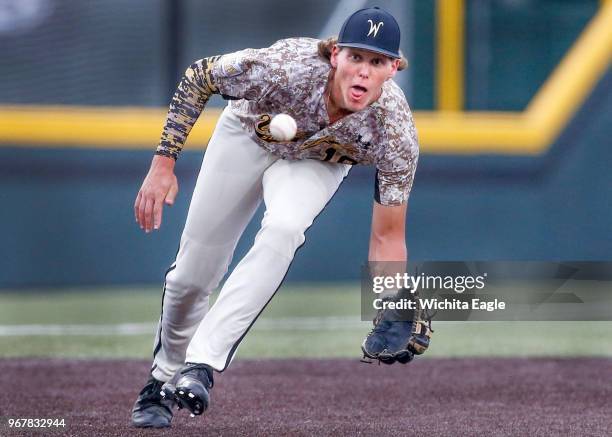 Wichita State third baseman Alec Bohm zeros in on a ground ball for an out against Kansas State in the sixth inning on May 16, 2017 at Eck Stadium in...