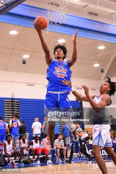 Richard Springs from The MacDuffie School goes up for a layup during the Pangos All-American Camp on June 2, 2018 at Cerritos College in Norwalk, CA.