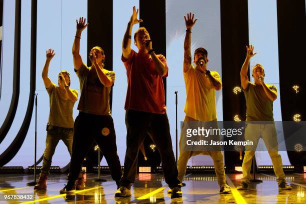 Brian Littrell, Kevin Richardson, Nick Carter, AJ McLean and Howie Dorough of musical group Backstreet Boys perform onstage during Day 2 2018 CMT...