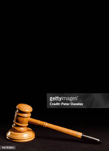 auctioneer's judges gavel on black background - peter law foto e immagini stock