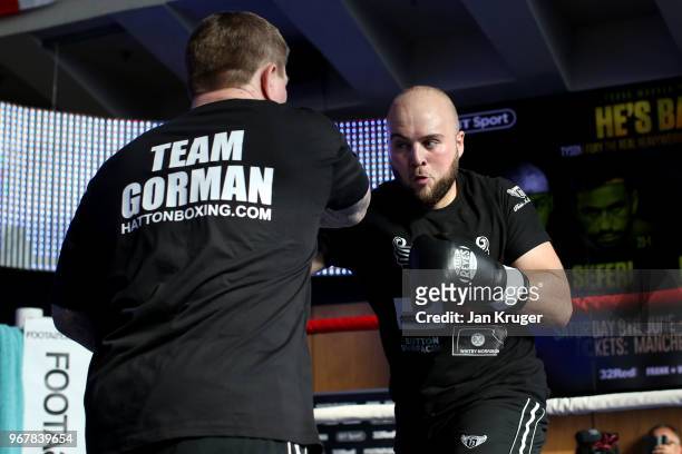 Ricky Hatton trains with Nathan Gorman during a public workout at the National Football Museum on June 5, 2018 in Manchester, England.