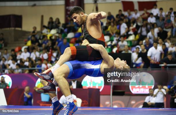 Suleyman Erbay of Turkey in action against Aleksandr Golovin of Russia during the semi-final match at the U23 Senior European Championships in...