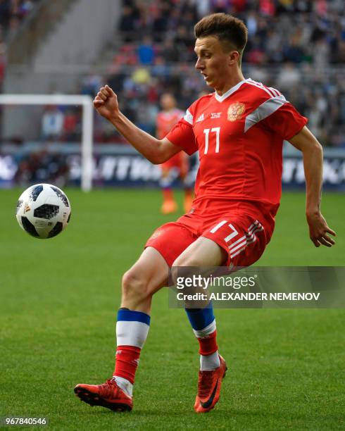Russia's Alexander Golovin controls the ball during an international friendly football match between Russia and Turkey at Moscow's VEB Arena on June...