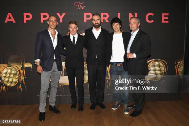 Actors Tom Colley, Edwin Thomas, Director Rupert Everett and actors Colin Morgan and Julian Wadham attend the UK premiere of 'The Happy Prince' at...