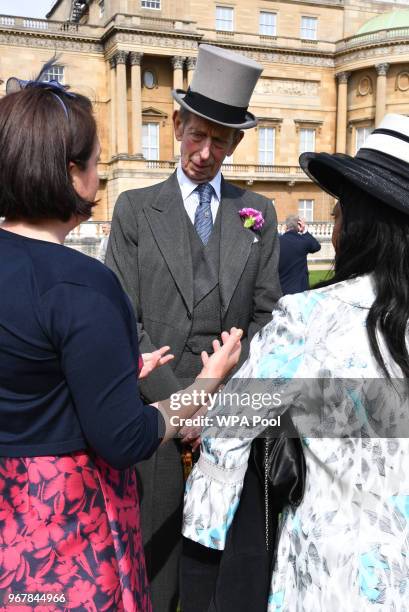 Prince Edward, Duke of Kent talks to guests as they attend a Buckingham Palace Garden Party at Buckingham Palace on June 5, 2018 in London, England.