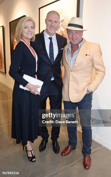 Niamh O'Brien, Jean-David Malat and Michael Flatley attend the Grand Opening of JD Malat Gallery in Mayfair on June 5, 2018 in London, England.