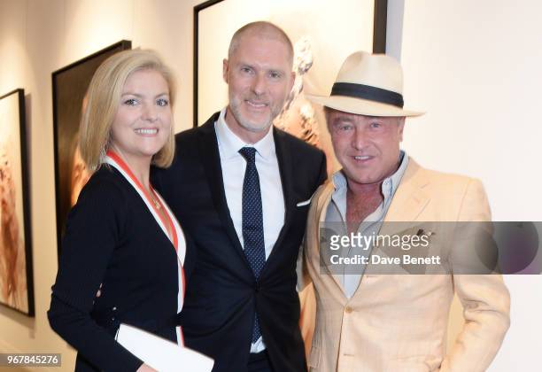 Niamh O'Brien, Jean-David Malat and Michael Flatley attend the Grand Opening of JD Malat Gallery in Mayfair on June 5, 2018 in London, England.
