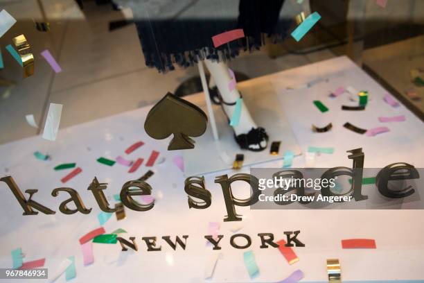 Kate Spade logo is seen on a Madison Avenue storefront City after fashion designer Kate Spade was found dead in her apartment of an apparent suicide...