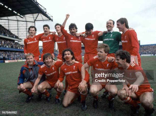 Liverpool celebrate winning the First Division Championship on the final day of the season after the Canon League Division One match between Chelsea...