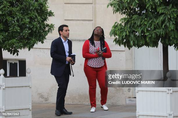 Presidential political advisor Stephane Sejourne and Presidential communication and press advisor Sibeth Ndiaye walk at the Elysee Palace in Paris,...