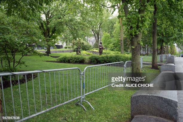 Barriers are erected around the National Assembly of Quebec in Quebec City on June 5 in preparation for the G7 Summit. - Attention this week turns to...