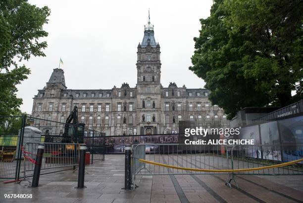 Barriers are erected around the National Assembly of Quebec in Quebec City on June 5 in preparation for the G7 Summit. - Attention this week turns to...