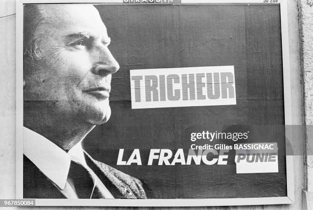 Détournement d'une affiche de campagne de François Mitterrand à Paris le 15 avril 1988, France.