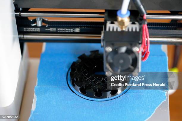 Printer churns out a seed wheel at Kennebec Valley Community College.