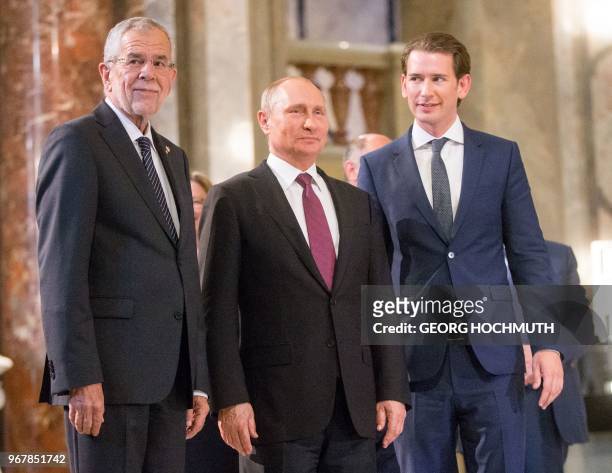 Austrian Federal President Alexander Van der Bellen, Russian President Vladimir Putin and Austrian Chancellor Sebastian Kurz arrive to the...