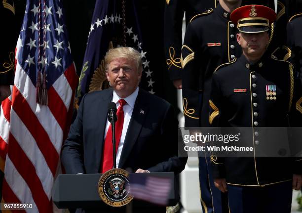 President Donald Trump concludes his remarks during a "Celebration of America" event on the south lawn of the White House June 5, 2018 in Washington,...