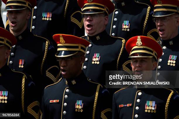 Members of an army chorus sing during "Celebration of America" at the White House in Washington, DC, on June 5, 2018. - Trump's "The Celebration of...