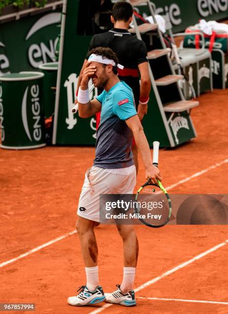 Marco Cecchinato of Italy is overcome with emotion after defeating Novak Djokovic of Serbia 6-3 7-6 1-6 7-6 in the Quarter Finals of the men's...