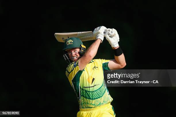Dan Christian of the Australian Indigenous Men's cricket team hits the winn\ing runs at Arundel cricket ground in the match against the MCC on June...