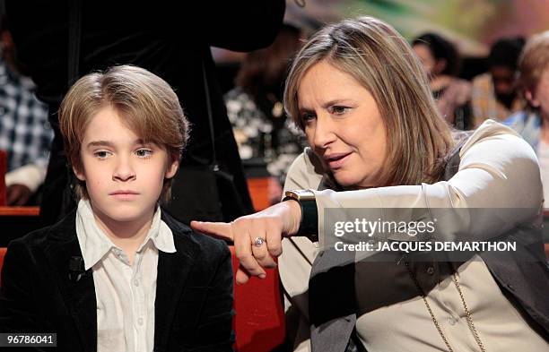 French director Roselyne Bosch speaks with French actor Hugo Leverdez prior to take part in a special Tv show on "The Rafle du Vel'd'Hiv" on the...