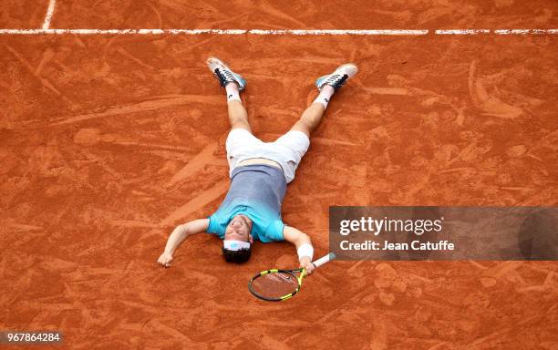 Marco Cecchinato of Italy celebrates his victory over Novak Djokovic of Serbia during Day 10 of the 2018 French Open at Roland Garros stadium on June...