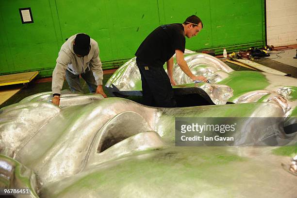 Stage technicians assemble the giant BAFTA masks prior to the BAFTA Awards 2010 at the Royal Opera House on February 17, 2010 in London, England.