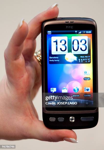 The new mobile phone "Desire" by HTC is displayed at the Mobile World Congress in Barcelona, on February 17, 2010. The 2010 Mobile World Congress is...